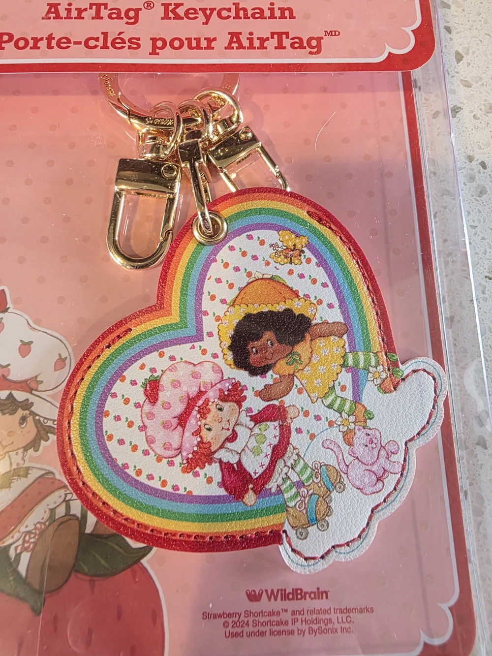 Sanrio Strawberry Shortcake Rainbow Heart AirTag Keychain - Pink